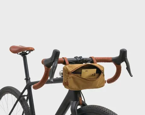 Ondrela gold card in a bicycle handlebar bag