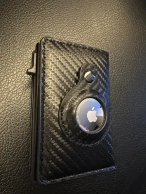 Customer photo of the SafeTrack Wallet with its AirTag slot